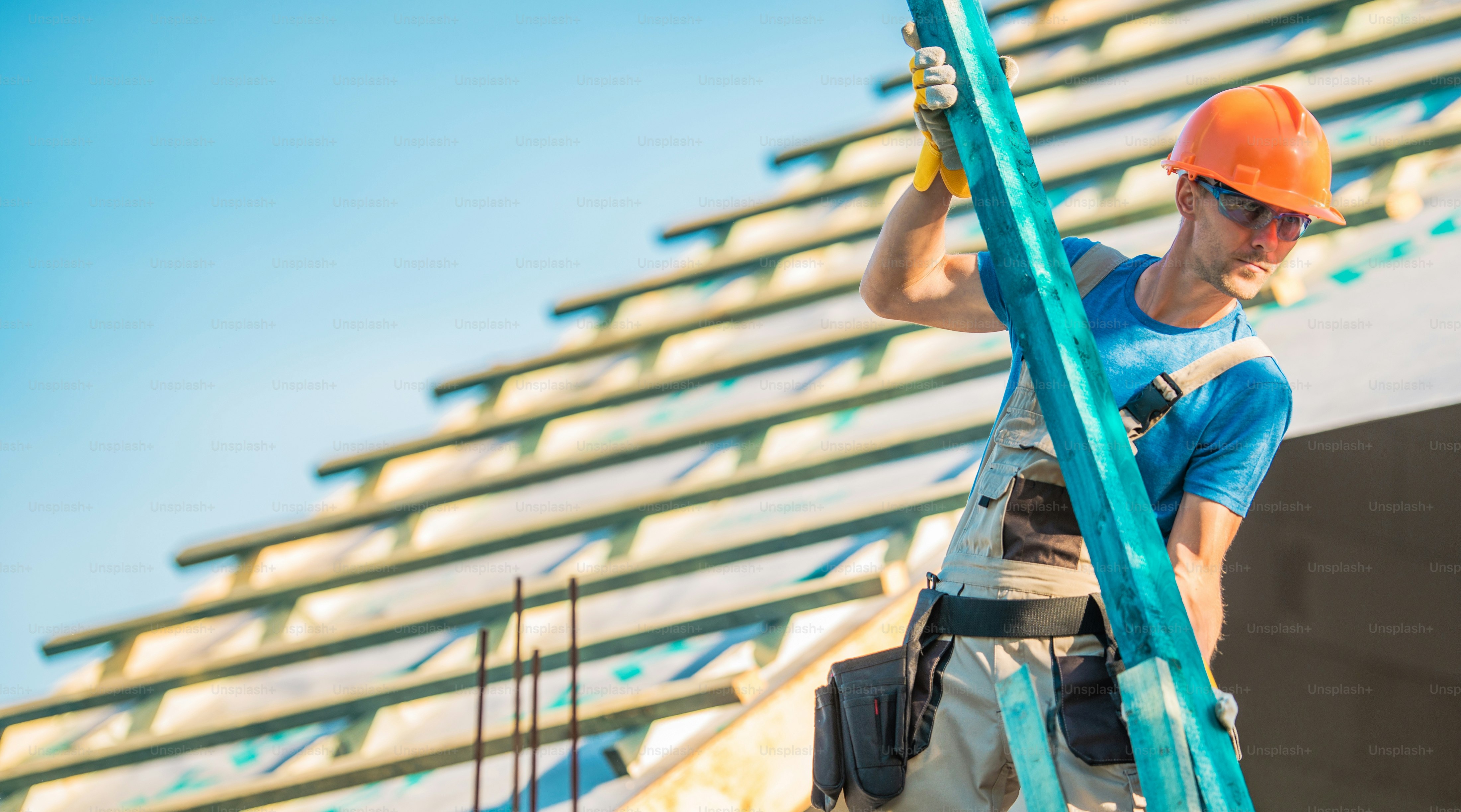 Roof Construction Wood. Caucasian Roofer with Wooden Building Structure Element. House Construction Site